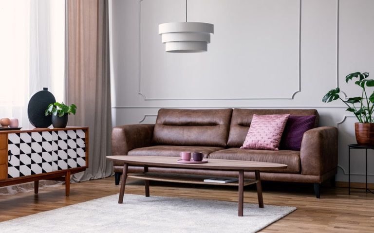 Create a Versatile Living Area with a Leather Sofa and Coffee Table